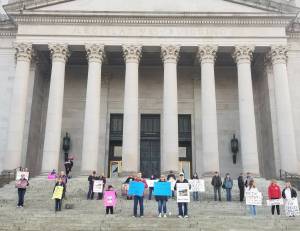 Supporters of H.B. 1397 aka the Oakley Carlson Act rallied for a silent gathering at the north steps of the Legislative Building on Friday, Feb. 10, in Olympia. The first committee hearing for the proposed legislative is slated to begin on Feb. 17 (Allen Leister / The Daily World)