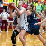 PHOTO BY FOREST WORGUM Montesano senior forward McKynnlie Dalan (34) looks to score against Kings Way Christian defender Izzy Hill during the Bulldogs 58-32 victory in a 1A District 4 semifinal game on Saturday in Montesano.