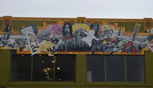 Matthew N. Wells / The Daily World 
Lee and Dani Bacon, a couple who lives in Ocean Shores, has a plan to bring more for Nirvana fans who thirst for more Kurt Cobain history. Cobain, from Aberdeen, founded Nirvana. The Bacons want to bring more of his history to the forefront with a project that includes this urban moss building at the intersection of South K and West Wishkah Streets.