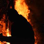 (Matthew N. Wells / The Daily World) The bear burned slowly, yet with a large flame, needing leaf blowers to provide oxygen on Saturday, Feb. 11.