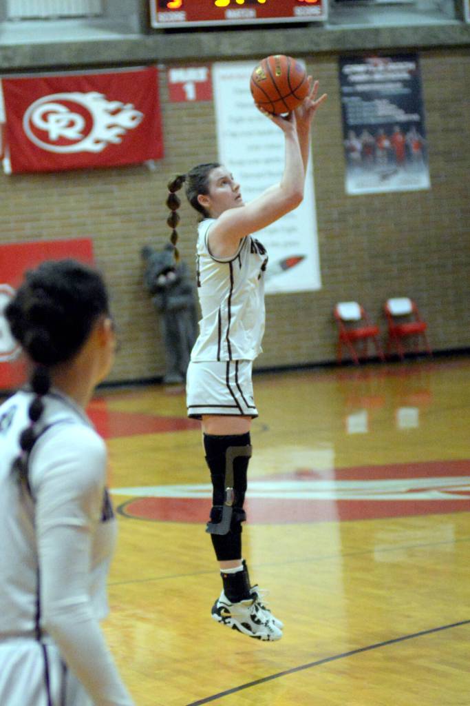 RYAN SPARKS | THE DAILY WORLD Montesanos McKynnlie Dalan hits one of her five 3-pointers during a 72-36 win over Seton Catholic in the 1A District 4 Championship game on Friday at Castle Rock High School.