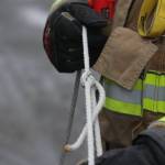Volunteer firefighters taking part in the countys firefighter academy are expected to be proficient in tying a number of knots, and are required to keep a specific length of rope on them at all times. (Michael S. Lockett / The Daily World)