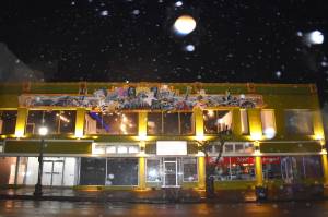 Matthew N. Wells / The Daily World 
The Side One Building, illuminated with white lights on Monday night, ushers in what Lee and Dani Bacon hope will lead to more fanfare, easier exposure and tourists in search of all things Kurt Cobain and Nirvana in downtown Aberdeen. The Side One Building sits at the intersection of South K and West Wishkah Streets.