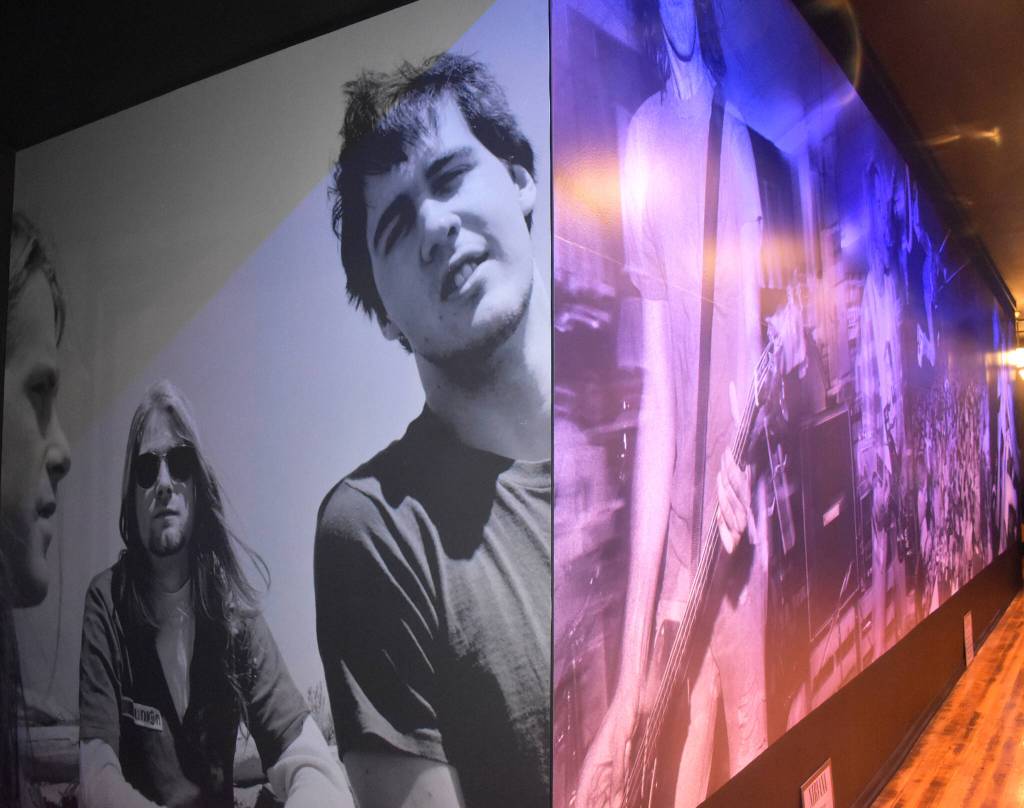 Sylvia Dickerson, who has helped commission the murals throughout downtown Aberdeen, loves the entrance to the Side One Building that leads to this photo of Nirvanas early days. I love when coming through the door on Wishkah (Street) youve got Krist Novoselic and Kurt Cobain staring at you in the face. Note: The archival photos that line The Green Room are by Charles Peterson. (Matthew N. Wells / The Daily World)