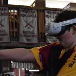 Makai Strum, a member of the Hoquiam Esports middle school team, plays a game of Echo VR, a virtual reality game where players control bodies of robots and attempt to score on opponents in something like a zero-gravity hockey arena. (Clayton Franke / The Daily World)
