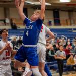 PHOTO BY FOREST WORGUM Elmas Grant Vessey drives to the basket during the Eagles 71-56 loss to Seattle Academy in a 1A State playoff game on Saturday at W.F. West High School in Chehalis.