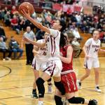 ALEC DIETZ | THE CHRONICLE Raymond guard Megan Kongbouakhay scores on a layup against Davenport in the first round of the Gulls 50-42 victory over Davenport in the 2B State Tournament at W.F. West on Saturday.