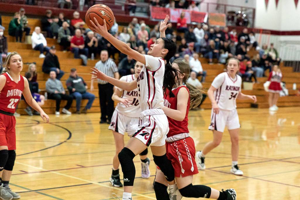 ALEC DIETZ | THE CHRONICLE Raymond guard Megan Kongbouakhay scores on a layup against Davenport in the first round of the Gulls 50-42 victory over Davenport in the 2B State Tournament at W.F. West on Saturday.