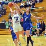 RYAN SPARKS | THE DAILY WORLD Willapa Valley senior Grace Huber (14) is fouled by Orcas Islands Bethany Carter during the Vikings 51-30 win in a 1B State first-round game on Saturday in Tumwater.