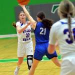 RYAN SPARKS | THE DAILY WORLD Willapa Valley point guard Brooklyn Patrick (20) sends a pass ahead to Hadlee Russell during the Vikings 51-30 win over Orcas Island in a 1B State first-round game on Saturday in Tumwater.