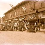 This photo, showing four automobiles parked in front of the former F.G. Foster Company building in Hoquiam, is from the late Beatrice and Vernon Andy Anderson. The pair saved a large number of glass plate negatives from the home of Ralph Emerson back when Andy was active as a photographer on the Harbor, according to John Larson, director at Polson Museum. The photo, taken in 1911, looks north on I Street  now Simpson Avenue, Larson said. The photo was taken during the opening of the F.G. Foster Company story, which is now an Edward Jones Investments office and near Swansons Foods in Hoquiam. As a vintage car fan, I particularly loved this image for the cars, Larson said. (Photo provided by Polson Museum)