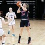 ALEC DIETZ | THE CHRONICLE Raymond guard Karsyn Freeman (24) takes a 3-pointer against Adna in the 2B State Round of 12 on Wednesday at the Spokane Arena.