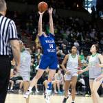 ALEC DIETZ | THE CHRONICLE Willapa Valley forward Grace Huber takes a off-balance shot against Inchelium in the 1B State Tournament Round of 12 at the Spokane Arena on Wednesday.