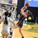 RYAN SPARKS / THE DAILY WORLD 
Montesano freshman Jillie Dalan, right, puts up a shot during the Bulldogs 64-36 loss to Wapato in a 1A State quarterfinal game on Thursday at the Yakima Valley SunDome.