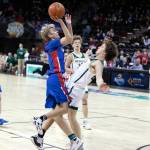 ALEC DIETZ | THE CHRONICLE Willapa Valley guard Riley Pearson, left, is called for a charge against DeSales on Saturday in the 1B 3rd/5th-place game at the Spokane Arena March 4.