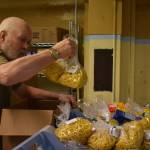 Clayton Franke / The Daily World
Steve Beck, a volunteer, packages pasta at the Salvation Army Food Bank in Aberdeen in December.