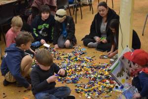 Children from ages six to 11 used their imaginations to build their lego creations alongside their fellow peers and parents during Lego Club at the Montesano Timberland Regional Library on Wednesday, March 8. (Allen Leister / The Daily World)
