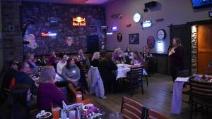 Allen Leister / The Daily World
More than 30 women gathered for Women & Wings to celebrate and reflect womens empowerment as well as enjoy deep-fried chicken wings during International Womens Day at Shujacks Bar & Grill, in Elma.