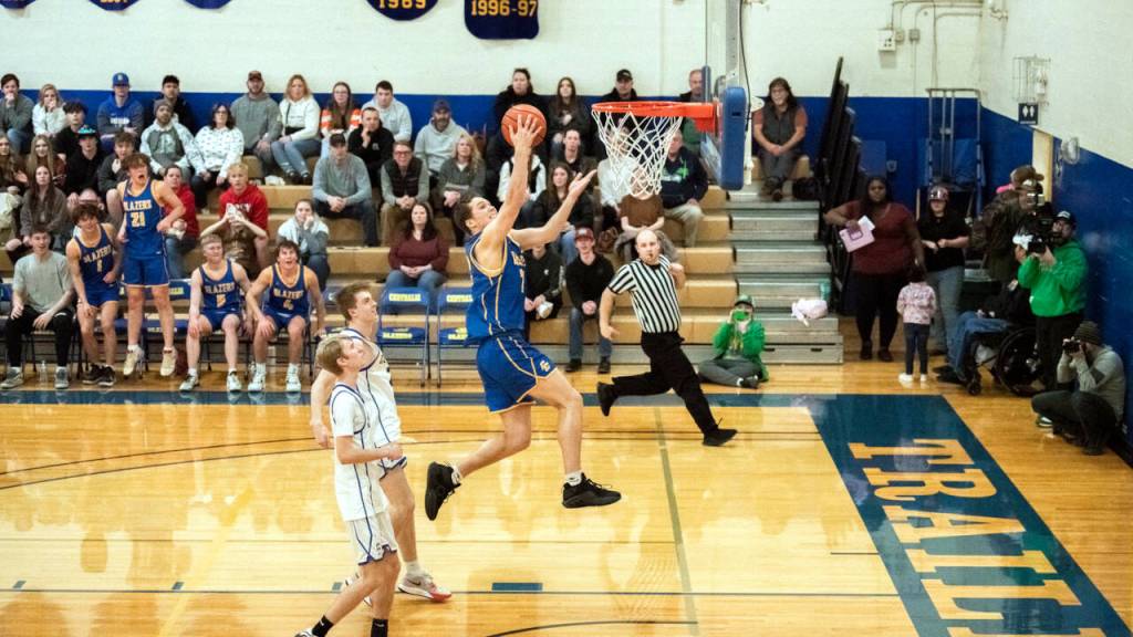 JARED WENZELBURGER | THE CHRONICLE Hoquiams Justice Stankavich, right, looks to score during the Southwest Washington High School All-Star Game on Friday at Centralia College. Willapa Valleys Riley Pearson, foreground, looks on.