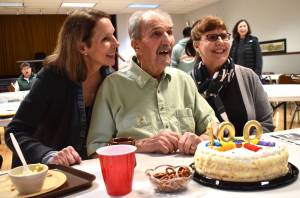 Matthew N. Wells / The Daily World 
Rudy Spanich and his daughters, from left, Debbie Ramstad and Kathy Wise, celebrate Spanichs 100th birthday. Spanich turned 100 on Sunday since he was reminded he was 100 and two days old, on Tuesday. The family, along with at least 100 Hoquiam Lions Club members, celebrated Spanichs centennial and the 65 years hes spent as a Hoquiam Lion at Hoquiam Elks Lodge.