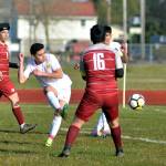 Photos by RYAN SPARKS / THE DAILY WORLD 
Aberdeen senior midfielder Carlos Mendoza, center, connects on a cross for a goal in the first half of the Bobcats 10-0 win over Hoquiam on Wednesday at Sea Breeze Oval in Hoquiam.
