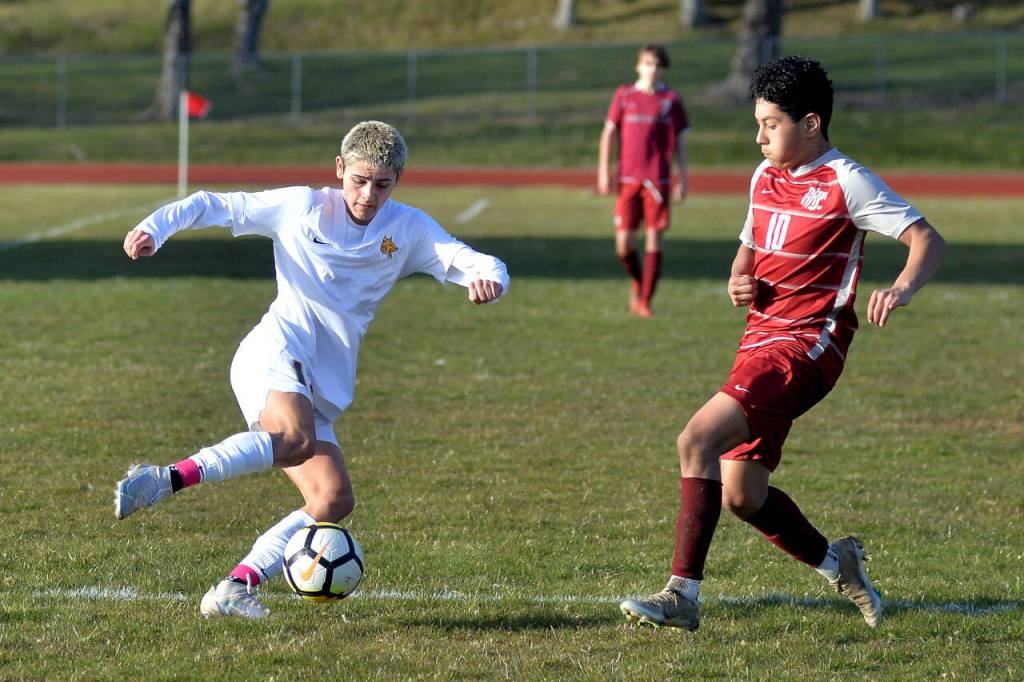 Aberdeens Colby Mendoza, left, dribbles against Hoquiams Santiago Martinez Ortiz during the Bobcats 10-0 win on Wednesday at Sea Breeze Oval in Hoquiam.