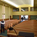 Chuck Guth, pastor for First Presbyterian Church of Aberdeen, shows his energetic spirit with a laugh during an interview with The Daily World. Guth was happy to join longtime parishioners Steve and Sue Cavin on what makes the church special. Guth also talked about what led to him moving to Aberdeen in order to become the pastor of the church — which celebrates its 135th anniversary on Sunday. (Matthew N. Wells / The Daily World)