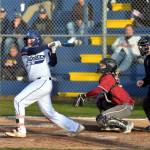 RYAN SPARKS | THE DAILY WORLD Aberdeens Trevon Nichols smacks a base hit during the Cats 10-0 victory over Hoquiam in the season-opener on Thursday at Pioneer Park in Aberdeen.