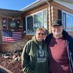 Clayton Franke / The Daily World
Deb (left) and David Wilson pose outside their mobile home in South Aberdeen.