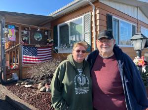 Clayton Franke / The Daily World
Deb (left) and David Wilson pose outside their mobile home in South Aberdeen.
