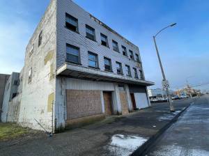 Smoke coming from an abandoned building led to a fire department response Monday morning, which discovered a campfire on the first floor. 
Michael S. Lockett
 / The Daily World