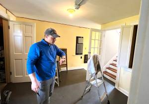 Matthew N. Wells / The Daily World
John Larson, executive director at Polson Museum, shows off the old servants laundry room inside the Polson Museum. The museum has been closed since Jan. 1, but it will reopen with an open house on Saturday. The open house goes from 11 a.m. to 4 p.m.