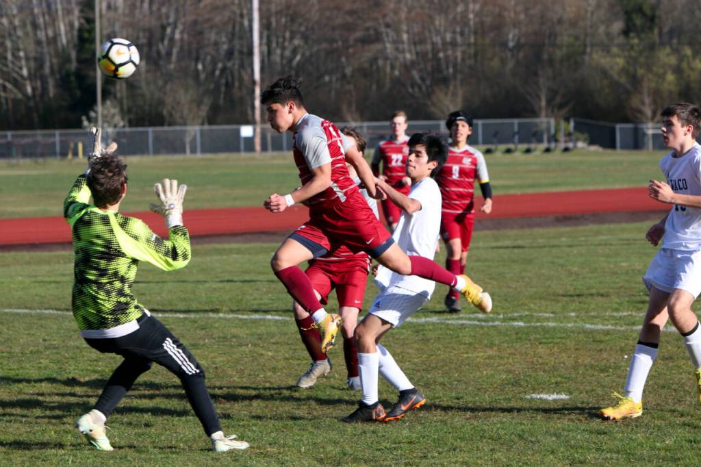 PHOTO BY BEN WINKELMAN Hoquiam freshman Brannon Gonzales scores on a header during a 7-1 win over Ilwaco on Wednesday in Hoquiam.