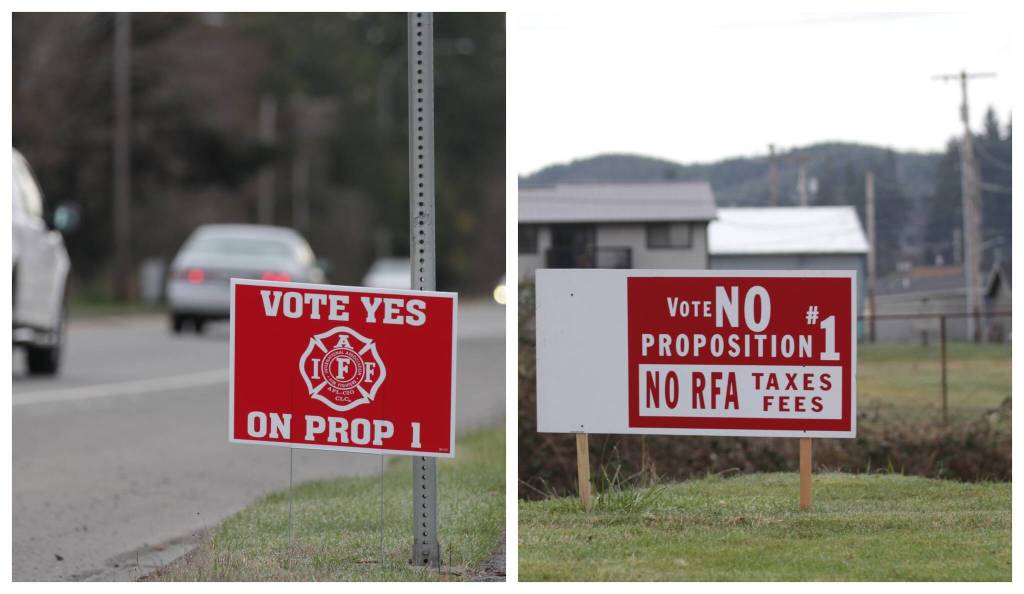 The proposed creation of a regional fire authority for Central Grays Harbor is turning into a contentious issue, as evidenced by signs besides the road to Cosmopolis. (Michael S. Lockett / The Daily World)