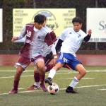 RYAN SPARKS | THE DAILY WORLD Elma midfielder Jose Perez (11) pivots away from Montesano midfielder Cristofer Tobar during the Bulldogs 2-1 win on Friday in Jack Rottle Field in Montesano.