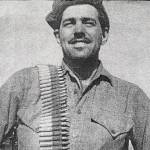 Courtesy photo / Jim Evans
Jim Evans, a Marine veteran of Korea and one of the Chosin Few, carries a belt of uncased machine gun ammunition over his shoulder during the war.