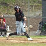 PHOTO BY FOREST WORGUM Montesanos Jackson Busz connects on a pitch during a doubleheader against Naches Valley on Saturday in Naches.