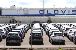 Michael S. Lockett / The Daily World
Cars awaiting embarkation sit in the Port of Grays Harbor in April after logistics hangups elsewhere on the West Coast caused them to be offloaded here in March.
