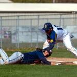 PHOTO BY FOREST WORGUM Aberdeen first baseman Kenny Dawson, right, tags out a Black Hills runner during a doubleheader sweep on Wednesday in Aberdeen.