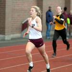 RYAN SPARKS | THE DAILY WORLD Montesanos Lilly Causey, left, sprints down the back stretch ahead of North Beachs Malia Cox to win the girls 200 meter race at the Ray Ryan Memorial Grays Harbor All-County Meet on Friday in Montesano.
