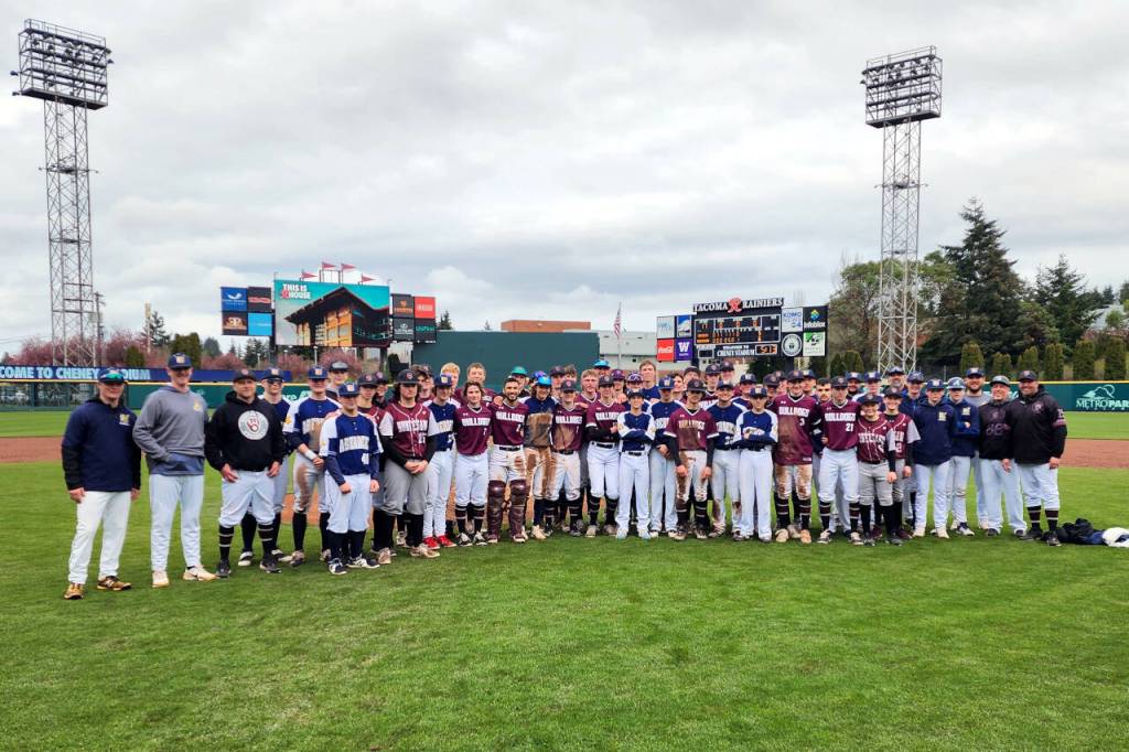 RYAN SPARKS | THE DAILY WORLD The Aberdeen Bobcats and Montesano Bulldogs pose for a photo after a game on Saturday at Cheney Field in Tacoma.