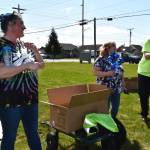 Matthew N. Wells / The Daily World
Staff members from nonprofit organization The Moore Wright Group  Amber Wessel, Anne Guadagnolo and Joey Hubbard  seemed to enjoy themselves as they worked Friday to plant 1,200 pinwheels for National Child Abuse Prevention Month.