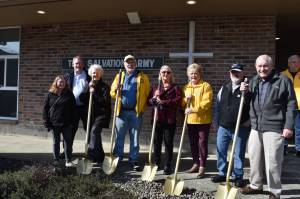 Clayton Franke / The Daily World
From left: Kim Gilbert, Shaun Jones, Ruthann Carlson, Steve Beck, Judi Hubbard Candy Palmer, Doug McDowell and Gene Schermer pose on Friday, April 14 outside the Salvation Army church on G Street, the nonprofits future local headquarters.