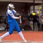 PHOTO BY FOREST WORGUM Elmas Callie Galligan blasts a home run in the first inning of a 17-7 loss to Hoquiam on Tuesday in Montesano.