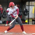 PHOTO BY FOREST WORGUM 
Hoquiams Ashlinn Cady smacks a double during the Grizzlies 17-7 win over Elma on Tuesday in Montesano.