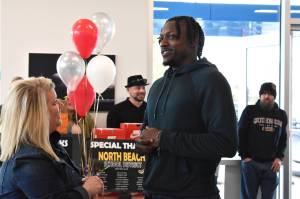 Photos by Matthew N. Wells / The Daily World
Seattle Seahawks NFL Pro Bowl Cornerback Tariq Woolen and Kelley McDonald, executive director of United Way of Grays Harbor, meet Wednesday afternoon at Five Star Dealerships in South Aberdeen  212 S. Boone St. Woolen was in town to thank the 70 area high school culinary arts students with brand new Nikes for the impressive job they did in January when they served about 400 people and raised more than $214,000 at the 22nd Annual United Way of Grays Harbor Black & White Gala.