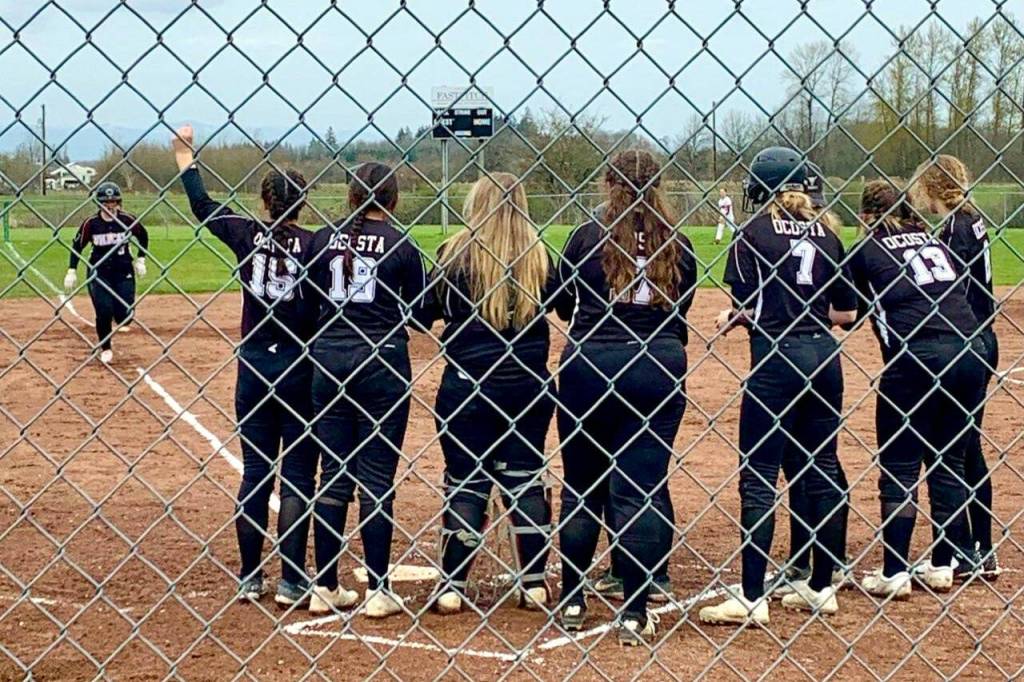 SUBMITTED PHOTO Ocostas Jessie Gilbert, left, rounds third after hitting a home run in an 8-4 win over Toledo on Friday in Toledo.