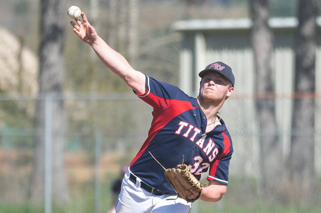 ALEC DIETZ | THE CHRONICLE Pe Ell-Willapa Valleys Garrett Keeton releases a pitch against Ilwaco on Tuesday in Pe Ell.