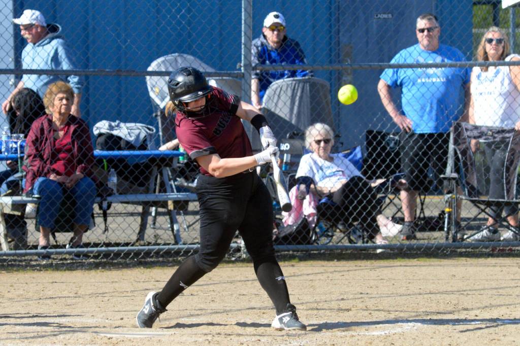 RYAN SPARKS | THE DAILY WORLD Montesano catcher Alisyn Parkin belts a solo home run during the Bulldogs 12-6 victory over Elma on Thursday in Elma.