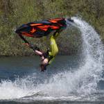 Photos by Clayton Franke / The Daily World
Freestyle jet-skier Tanner Thomas performs a backflip on Vance Creek Pond in Elma on Saturday, April 29, during the halftime show of the PNW Water X racing event.